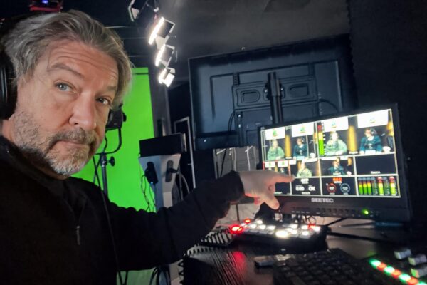 Producer at the live switcher in the studio control room