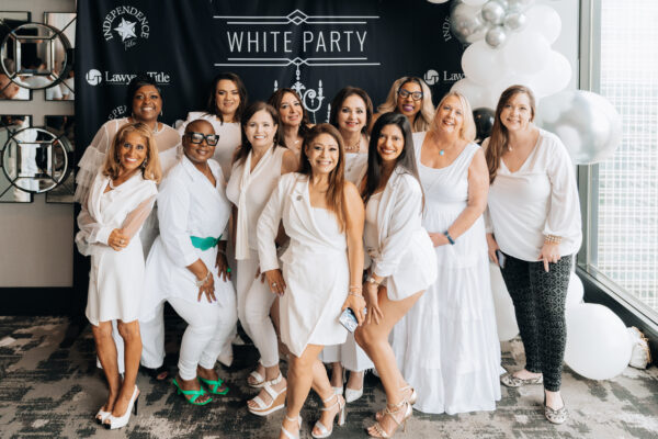Group photo at a white-themed party