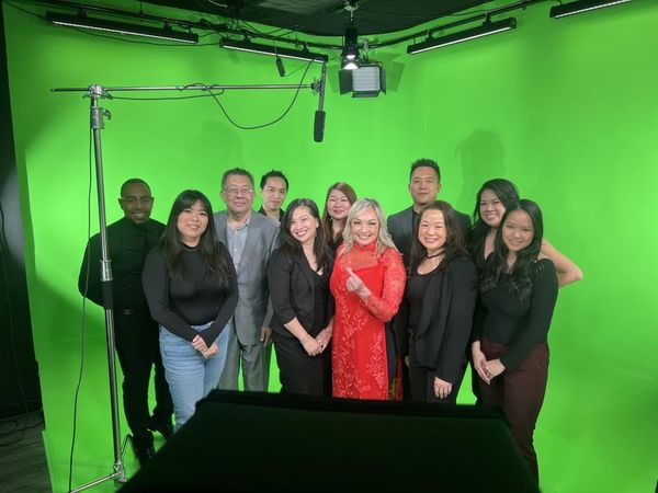 Group photo on the green screen stage at studioUSA East, a green screen studio in Plano