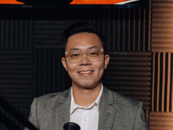 Podcast guest on set at studioUSA East, a podcast studio in Plano